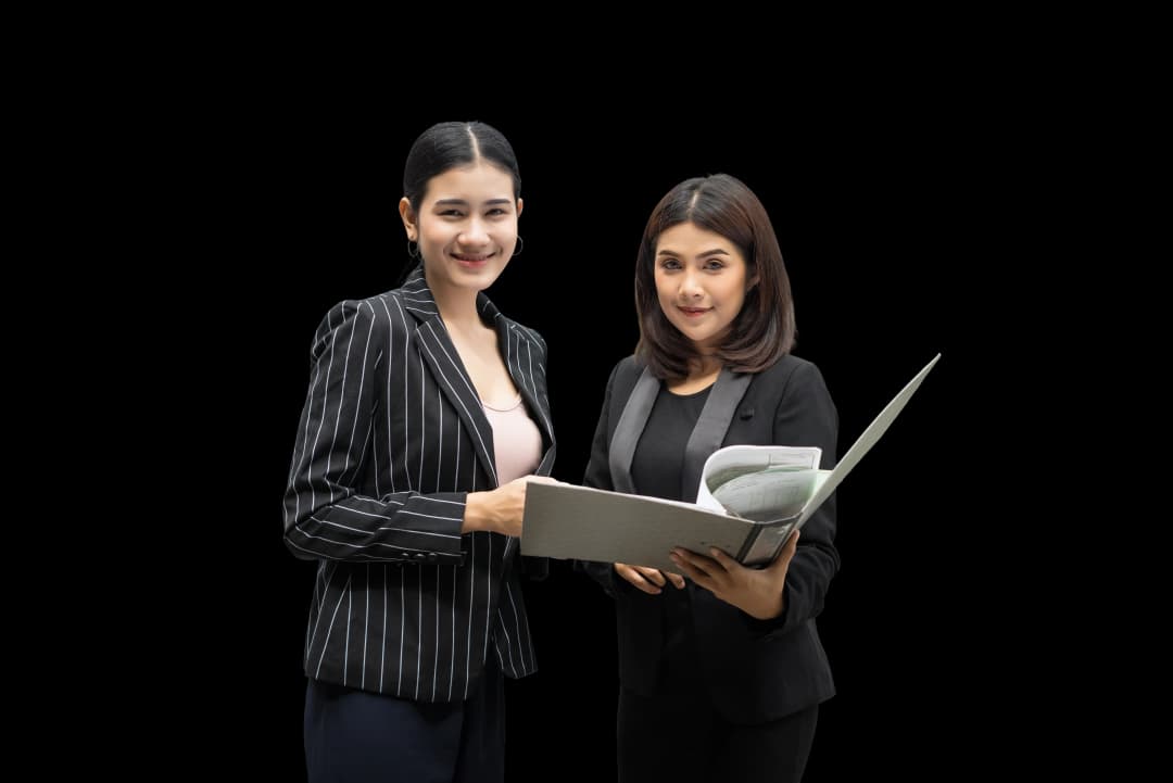 businesswomen-discussing-paperwork-together-against-railing-business-people-concept 